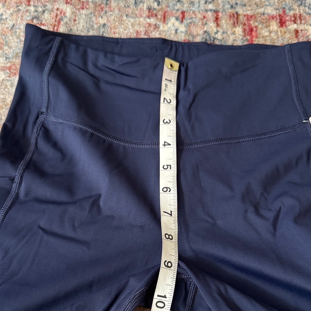 Athleta ultimate stash 7” pocket Navy High-Waisted Shorts - Picture 7 of 9